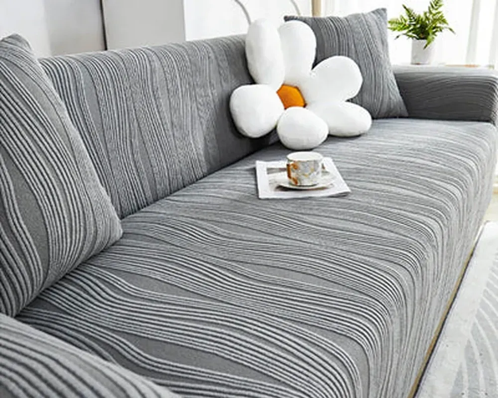 Best couch cover for pets in grey stripe pattern on sectional sofa - FunnyFuzzy couch cover alternative